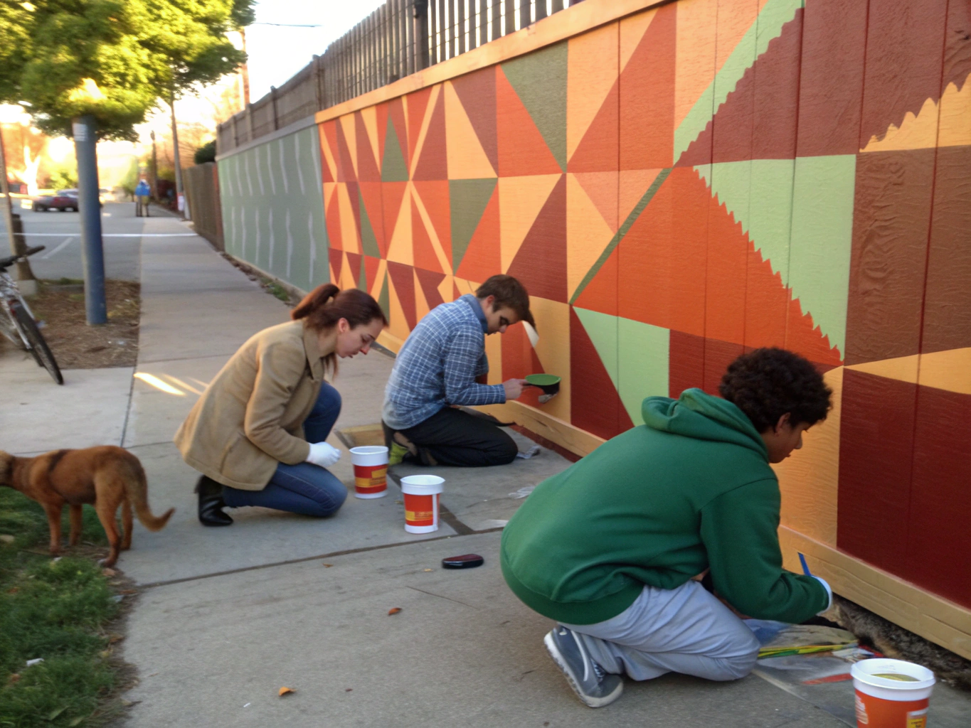 Community volunteers preparing a stage performance area